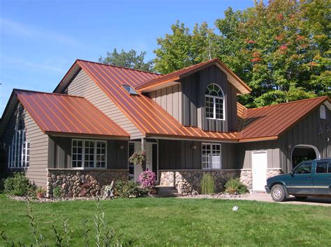 pictures of barn seam metal roofs on houses|batten house with metal roof.